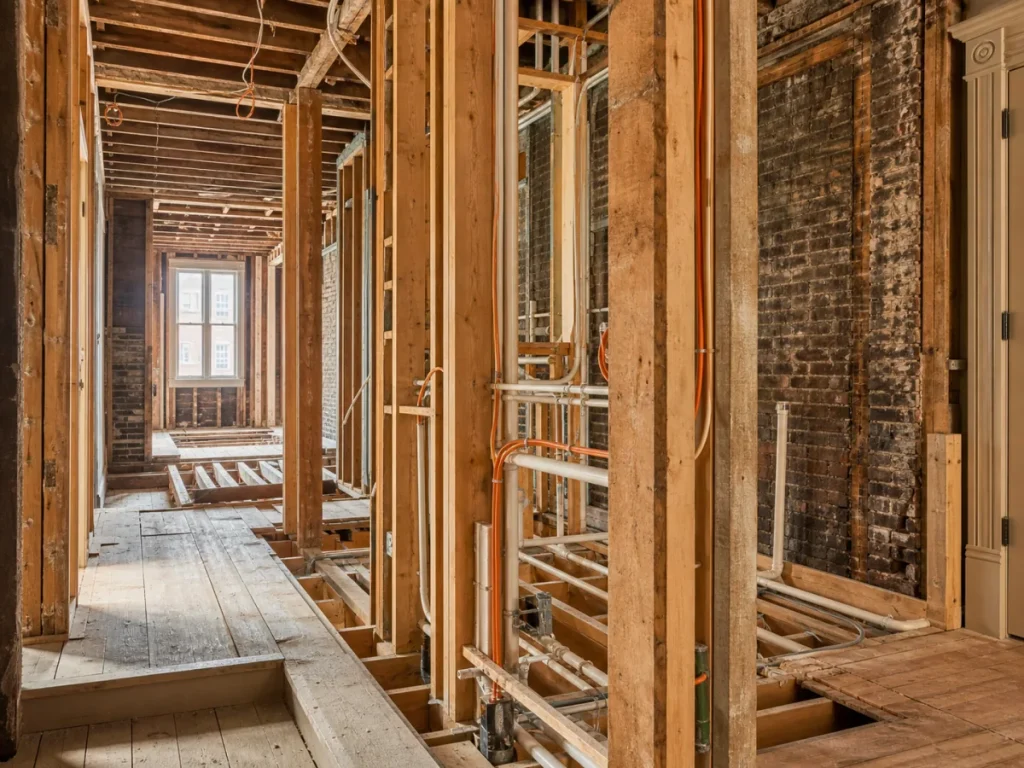 Wood-frame structural and mechanical renovation inside a West Village townhouse